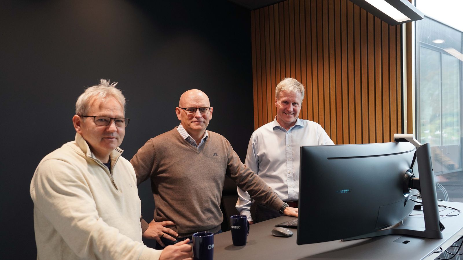 Ronny Almenning, Trond-Inge Kvernevik and Bjørn Bakkevig at a workstation in the Academy building