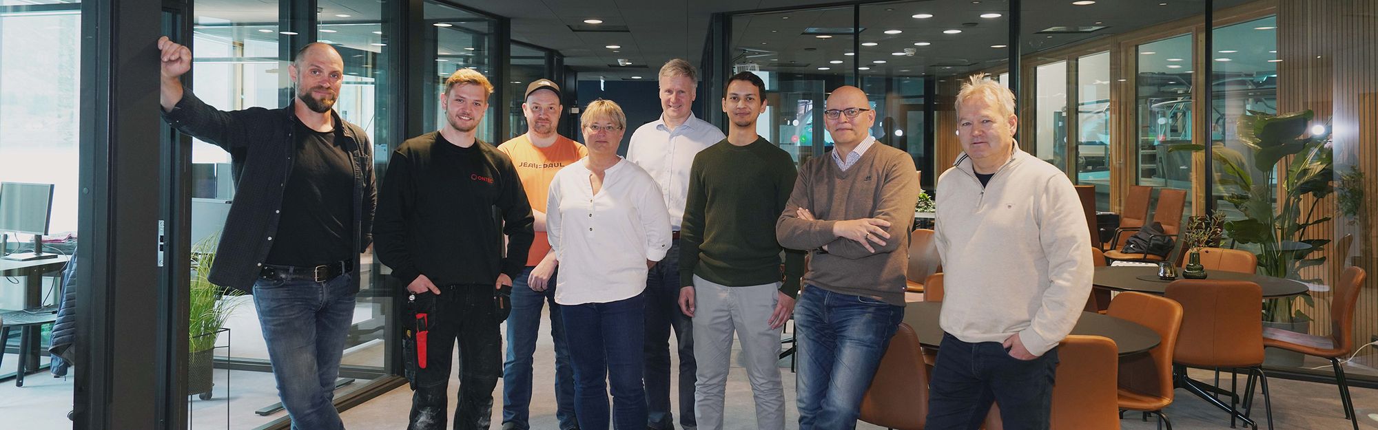 The Ontec team standing together in the office at Måløy